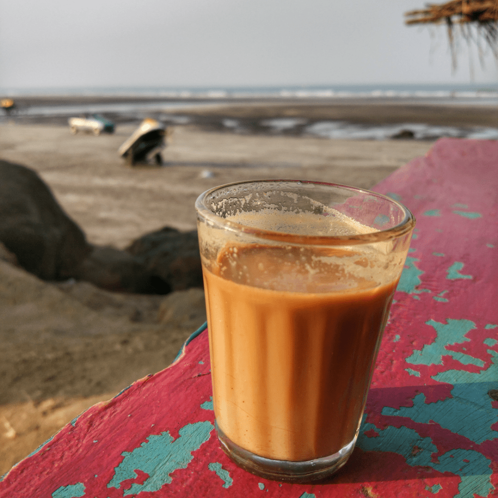 Cutting Chai on the Beach (Square crop).png